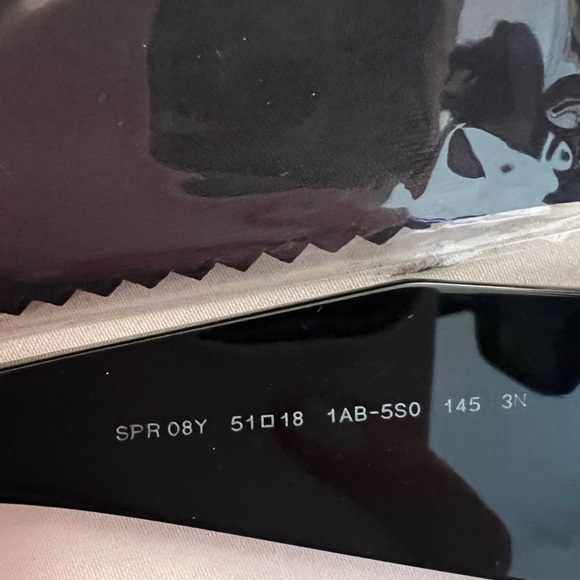 Prada
Marble Acetate Butterfly Sunglasses Black - Picture 8 of 8